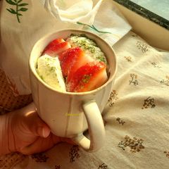 A picture of Matcha Mugcake with ice cream and Strawberry 🍓.
