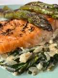 Baked Salmon with Asparagus on a Bed of Creamed Spinach