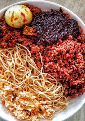 A picture of Waakye or Waashe with shito(check for my shito recipe).