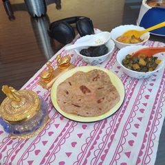 A picture of Multi grain roti, vegetables Ragi veg.soup noodle.