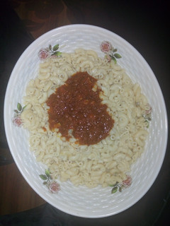 A picture of Macaroni with stew.