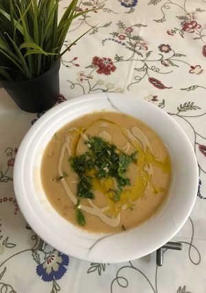 صورة لوصفة فول في قدر حجري