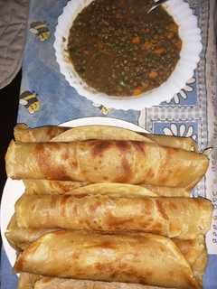 A picture of Layered chapati with kamande (one tree.