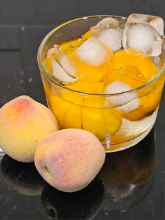 A picture of Peaches in syrup.