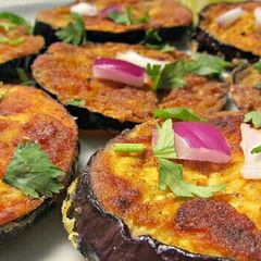 A picture of Cheese Bengali style baingan bhaja.