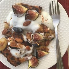 A picture of French toast hot cross buns with plain yoghurt, Caramelized bananas and figs.
