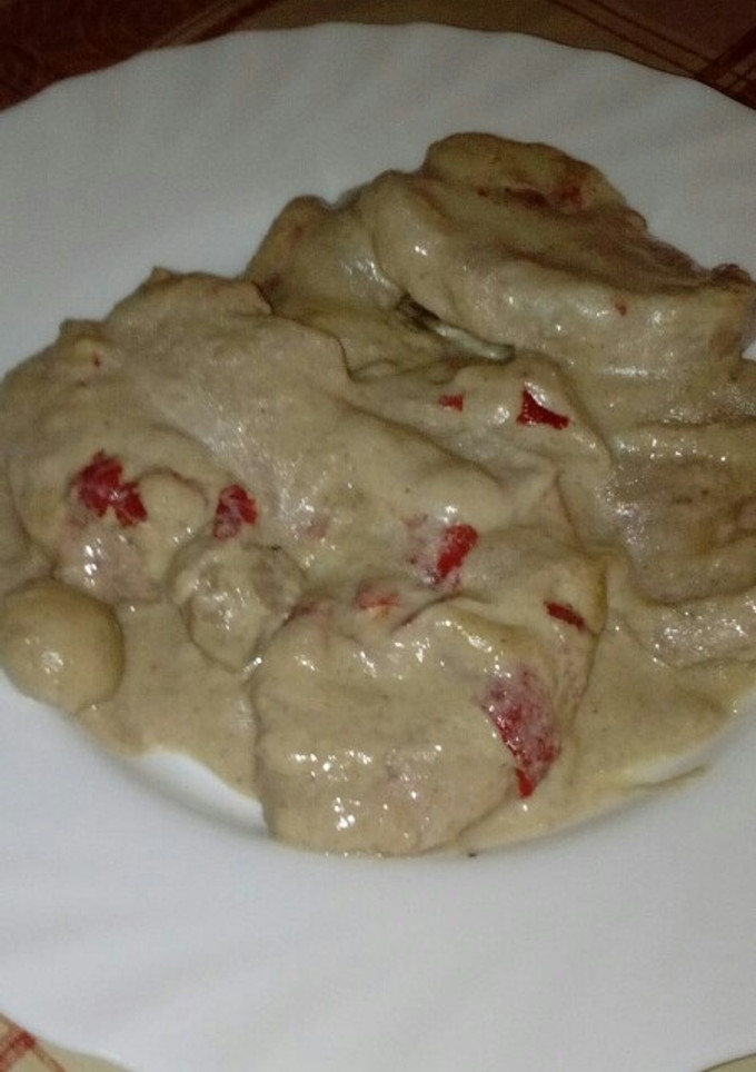 Una foto de Solomillo de cerdo con salsa de champiñones