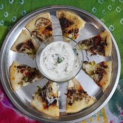 A picture of Suji Uttapam.