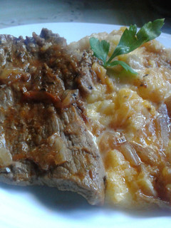 Una foto de Polenta con tuco