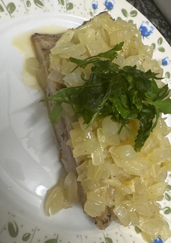 Una foto de 584. Secreto de cerdo con salsa de cebolla (principal carne)