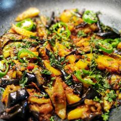 A picture of Baingan and Aloo fry.