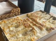 Una foto de canelones de pollo y pate
