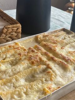 Una foto de Canelones de pollo