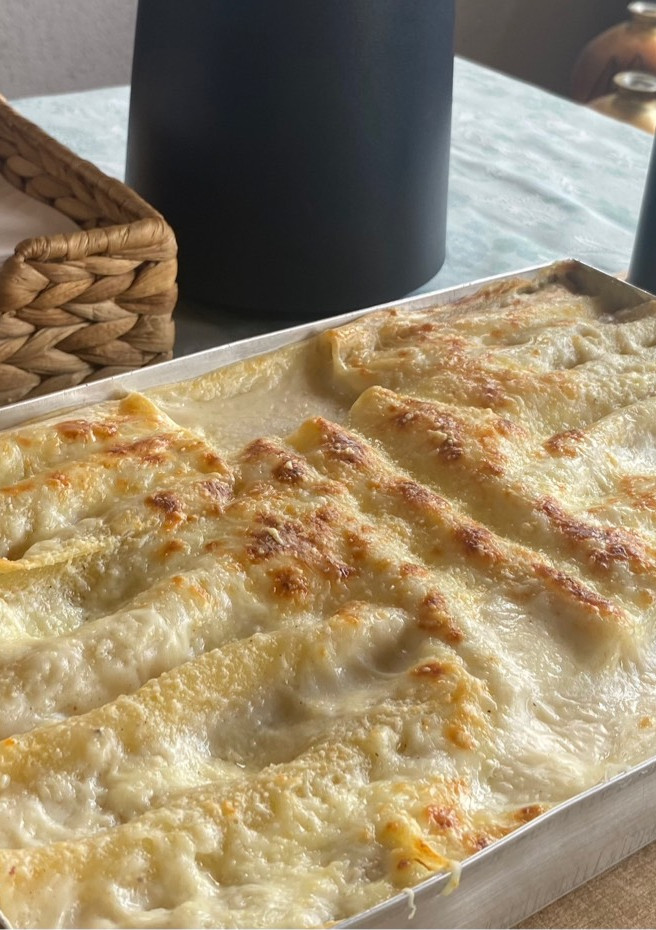 Una foto de Canelones de pollo