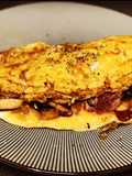 Tortilla de setas, calabacín, jamón y cebolla confitada con un toque oriental 🥢🥢