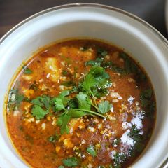 A picture of Marinated curd paneer capsicum gravy.