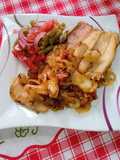 Boga al horno en cebolla y tomate