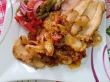 Boga al horno en cebolla y tomate