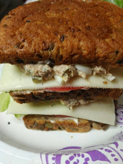 A picture of Triple Stacked Egg and Tuna Sandwiches.
