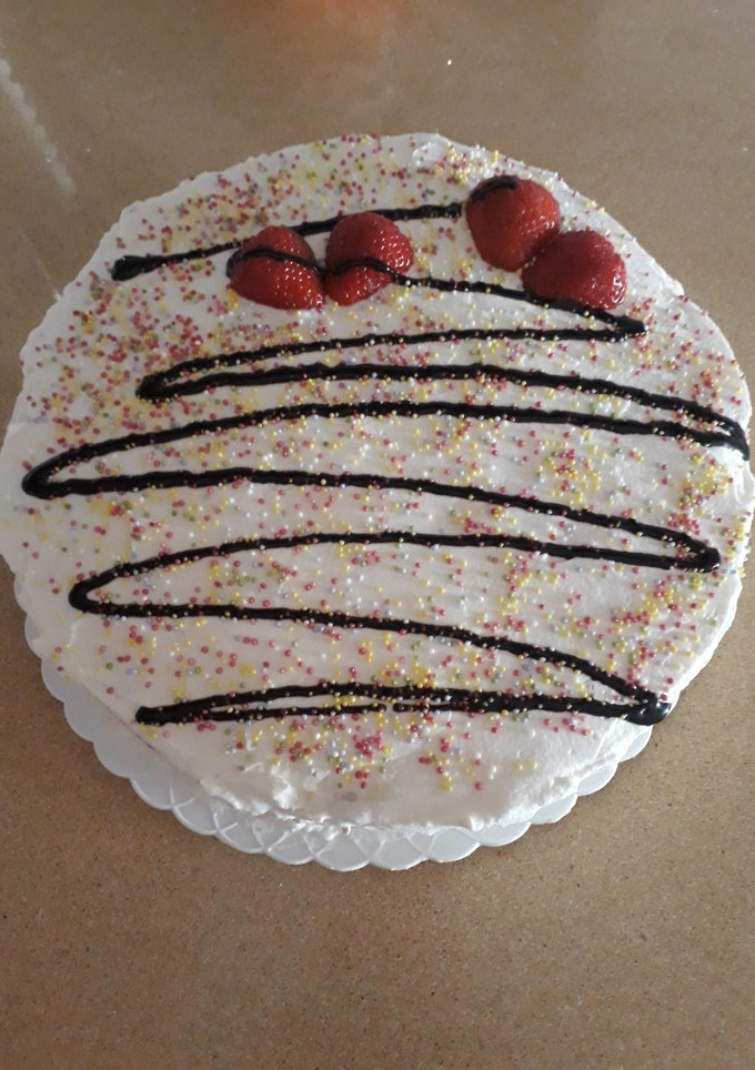 Una foto de Tarta de nata y fresas