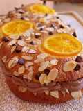 Coca de Sant Joan v3: De naranja confitada, almendras y pepitas de chocolate rellena de trufa y nata
