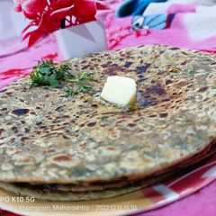 A picture of Methi matar malai stuffed paratha.