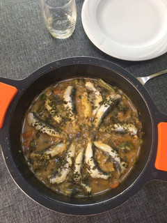 Una foto de Arroz meloso de boquerones🐟🐠