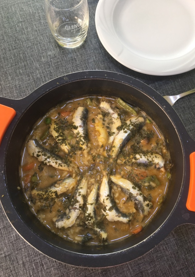 Una foto de Arroz meloso de boquerones🐟🐠