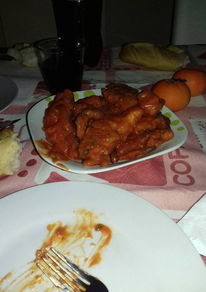 Una foto de Pescado en tomate