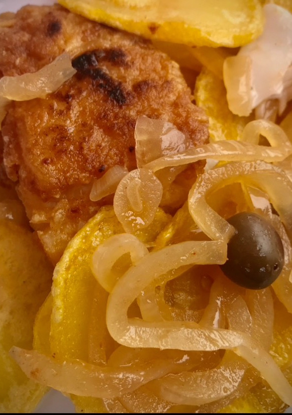 Una foto de Merluza de pincho frita