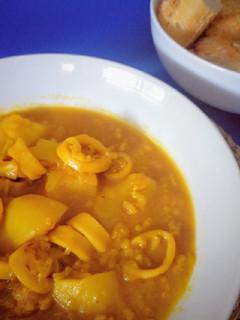 Una foto de Guiso de patatas con calamares