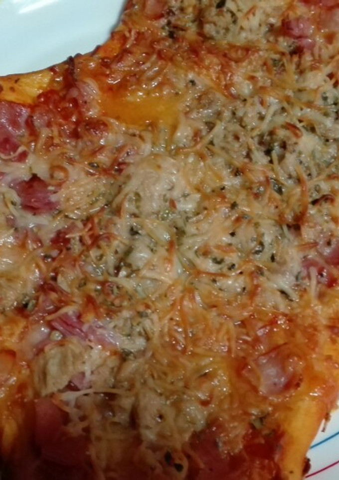Una foto de Pizza de bacon y queso