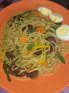 A picture of Stir fry pasta.