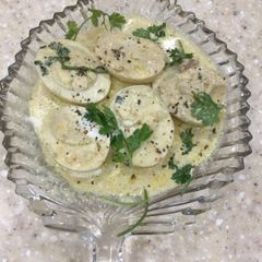A picture of Malai Egg Curry.