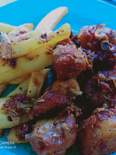 Una foto de Pollo al ajillo