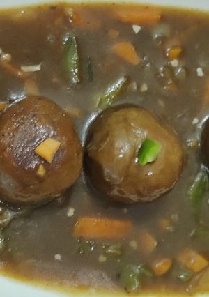 A picture of Raw banana kofte in chinese gravy.