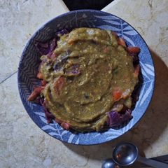 A picture of Cabbage with mashed sweet potato.