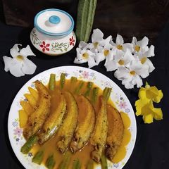 A picture of Pabda fish in Ridge Gourd / Turai.
