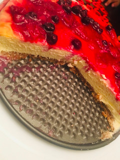 A picture of Cheesecake with strawberry topping🍓🍽🍓.