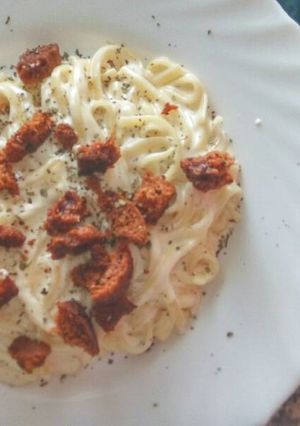 Una foto de Spaguetti con queso y picatostes