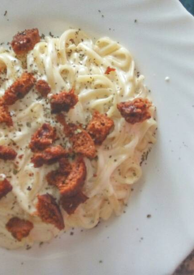 Una foto de Spaguetti con queso y picatostes