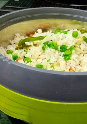 A picture of Leftover rice matar poha.