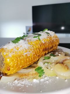 Una foto de Mazorca con queso & cilantro