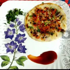 A picture of Veg.Uttapam.