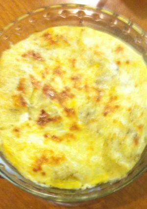 Una foto de Papas con queso al horno