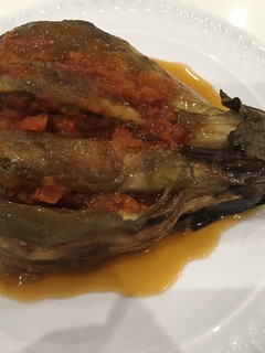 Una foto de Berenjenas con tomate
