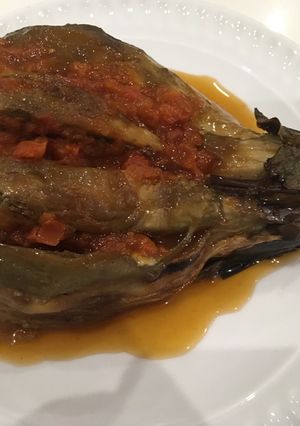 Una foto de Berenjenas con tomate