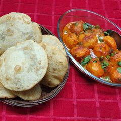 A picture of Radhaballavi & Aloo Dum.
