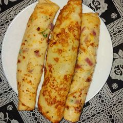 A picture of Onions rice flour chilla (pan cake).