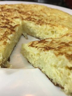 Una foto de Tortilla de papa rallada